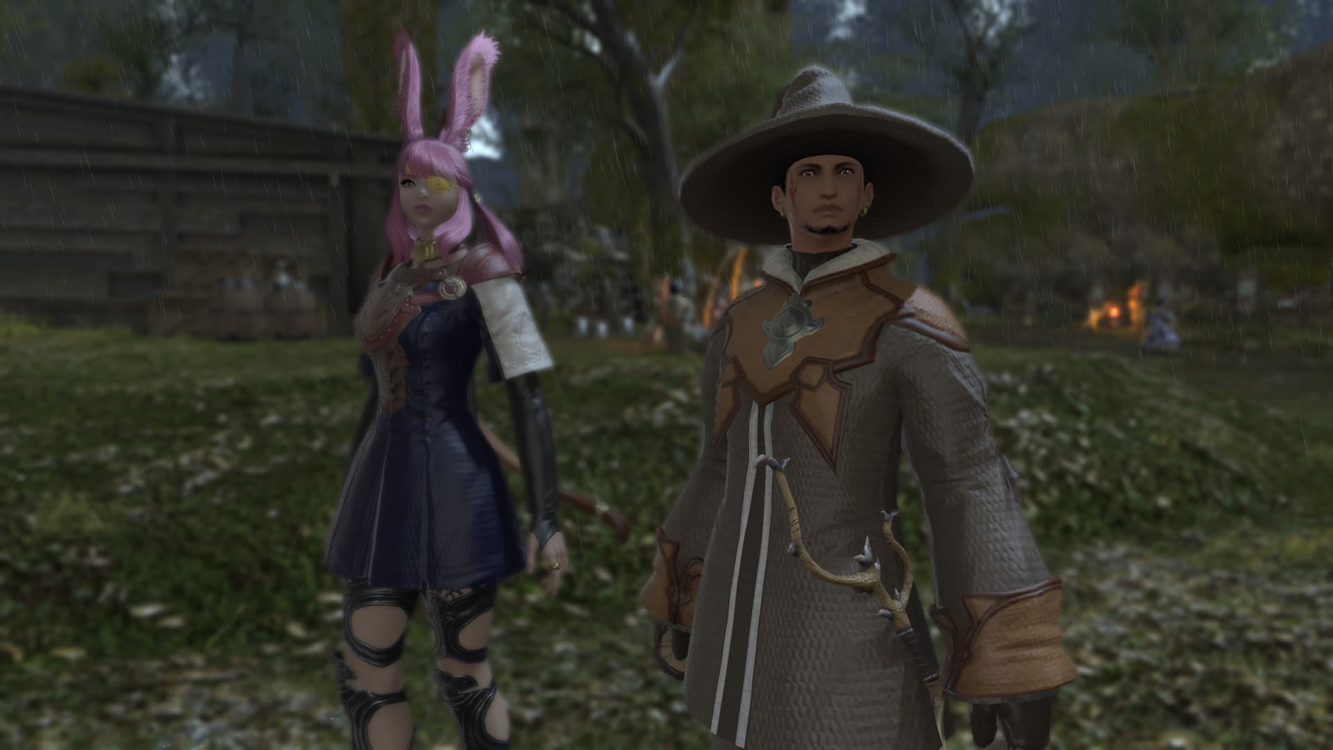 Two MMO Church members in the rain in Final Fantasy XIV